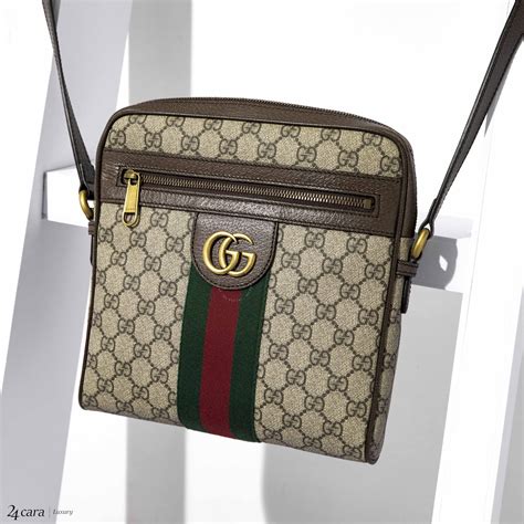 gucci messenger bag small next to hand|ophidia gg small messenger bag.